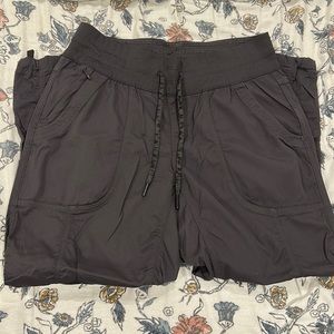 Capri, cinch-bottom North Face athletic pants.